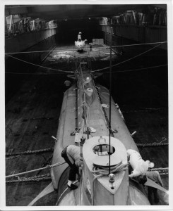 Alvin and Aluminaut in the well deck of either the Fort Snelling or the Plymouth Rock. The two submersibles were berthed together until Aluminaut's tender arrived. 